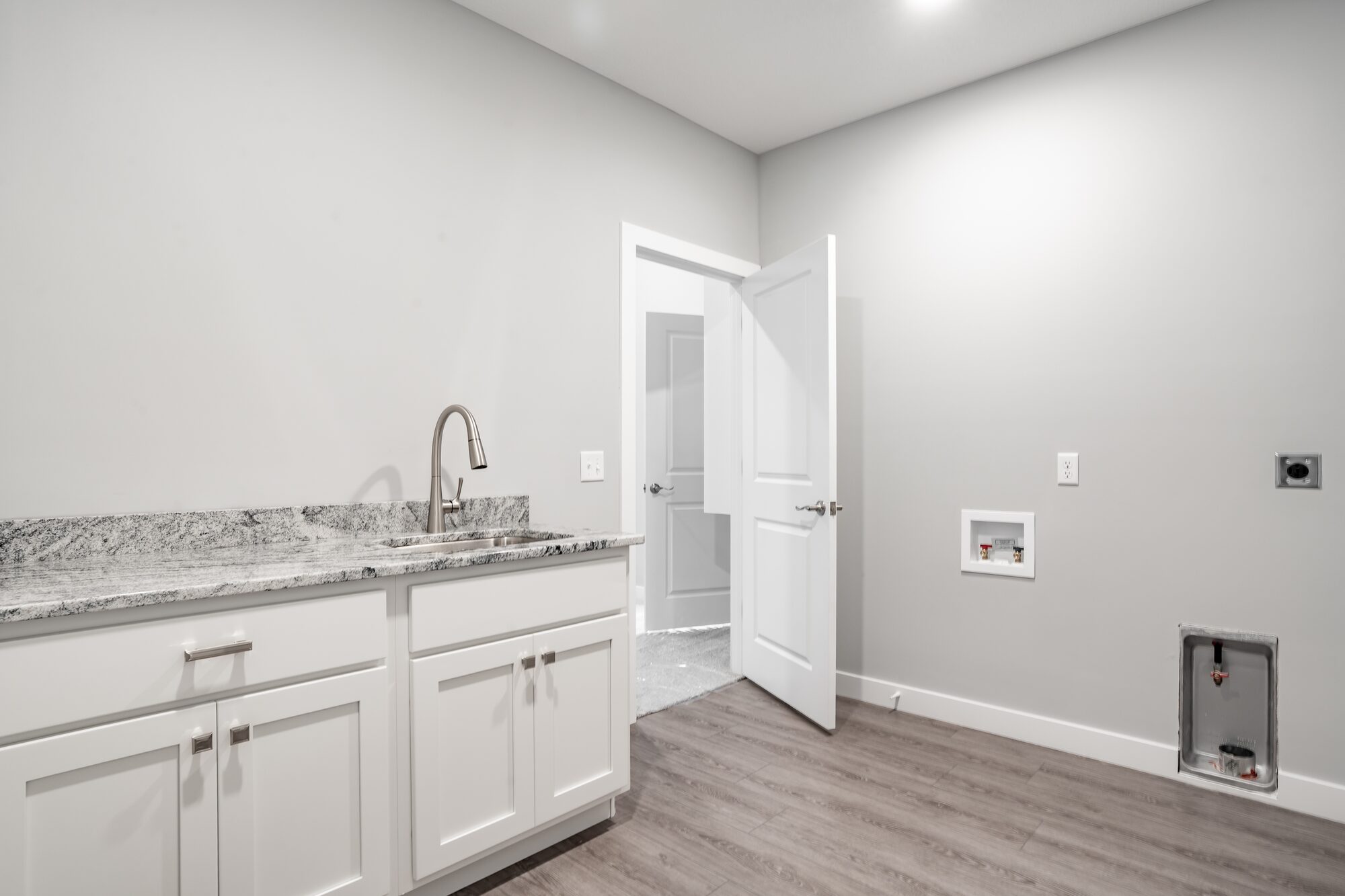 Luxury primary bathroom with freestanding tub